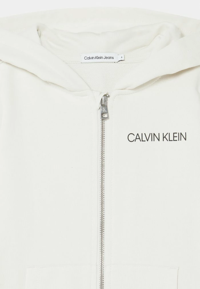 Calvin Klein Jeans INSTITUTIONAL LOGO ZIP-THROUGH UNISEX - Sweat à Capuche Zippé - Ivory 3 Calvin Klein Jeans INSTITUTIONAL LOGO ZIP-THROUGH UNISEX - Sweat à Capuche Zippé - Ivory – Image 3