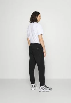 Calvin Klein Jeans TRACK - Jean Boyfriend - Denim Black -Calvin Klein Elegant Magasin ec6499f4eadb460f9b70b6a41d5ab328