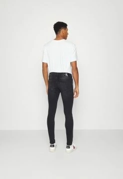 Calvin Klein Jeans SUPER SKINNY - Jeans Skinny - Denim Black -Calvin Klein Elegant Magasin ed2a977b186442aca208846f941c612a
