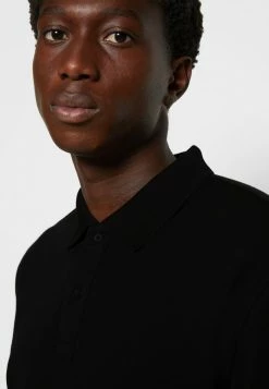 Calvin Klein Jeans MONOGRAM BADGE RELAXED - Polo - Black -Calvin Klein Elegant Magasin edbfeeb05586427680e29d18e0bbcf35