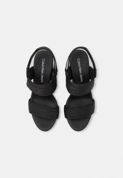 Calvin Klein Jeans WEDGE SLING - Sandales à Talons Hauts - Black -Calvin Klein Elegant Magasin eee93a16e5694e02b8af9f9bfbb16100