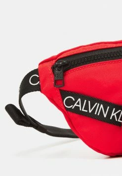 Calvin Klein Jeans LOGO TAPE WAISTBAG UNISEX - Sac Banane - Red -Calvin Klein Elegant Magasin f09df20a22324cf9a32334ad9f48abae