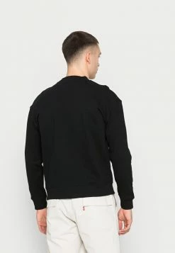 Calvin Klein Jeans DYNAMIC CREW NECK UNISEX - Sweatshirt - Black -Calvin Klein Elegant Magasin f14ee03b2a124c7caa3c2260b02f22e3