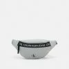 Calvin Klein Jeans LOGO TAPE WAISTBAG UNISEX - Sac Banane - Grey Dew