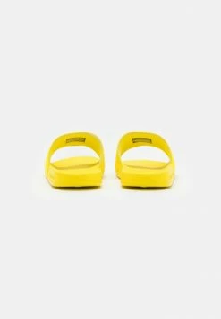 Calvin Klein Jeans SLIDE TAPE - Mules - Bright Sunshine 8 Calvin Klein Jeans SLIDE TAPE - Mules - Bright Sunshine -Calvin Klein Elegant Magasin f1b3da5218b146189d68123433427923