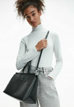 Calvin Klein Jeans Sac Bandoulière - Black -Calvin Klein Elegant Magasin f5f764048810453ebf6da0d2ee73c79c