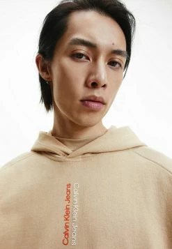 Calvin Klein Jeans Sweat à Capuche - Tawny Sand -Calvin Klein Elegant Magasin f65f132dcb9740a88a1a50f0c00aeb9a