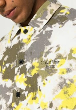 Calvin Klein Jeans UNISEX - Chemise - Camo Aop -Calvin Klein Elegant Magasin f6b54d01b4124fdc90333bd43f1d6953