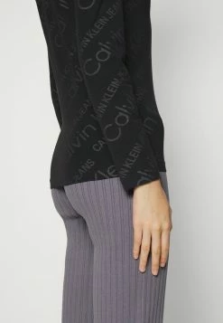 Calvin Klein Jeans LOGO ALL OVER ROLL NECK - T-shirt à Manches Longues - Black -Calvin Klein Elegant Magasin f70487beaf60424385fe90e784da297a