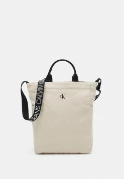 Calvin Klein Jeans LOGO TAPE TOTE - Cabas - Muslin