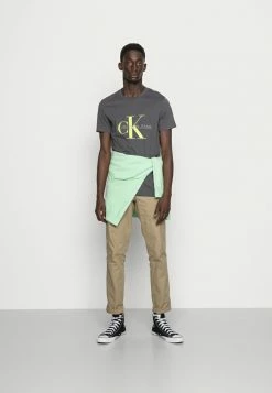 Calvin Klein Jeans SEASONAL MONOGRAM TEE - T-shirt Imprimé - Gray Pinstripe/acid Lime -Calvin Klein Elegant Magasin f764bfe6f21743499b7a3ad5f72a5cea