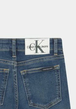 Calvin Klein Jeans SPLIT MID - Jeans Skinny - Dark Blue Denim -Calvin Klein Elegant Magasin fd37a4d38623494ca16eadd03da941b2